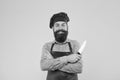 Hipster cook chopping and dicing using professional knife