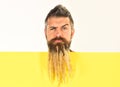 Hipster with curious face in autumn nature. Spikelet beard