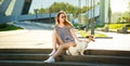 Hipster Fashion Girl with her Dog in the City Royalty Free Stock Photo