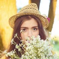 Hipster fashion girl in straw hat keep beauty