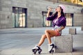 Hipster girl drink water and resting after active time Royalty Free Stock Photo