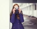 Hipster girl and old vitnage camera Royalty Free Stock Photo
