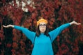 Happy Woman with Eyeglasses and Pumpkin Beret Enjoying Autumn Royalty Free Stock Photo