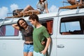 Hipster girl relaxing with friends in her summer road trip, care Royalty Free Stock Photo