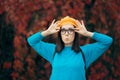 Funny Woman with Eyeglasses and Pumpkin Beret Enjoying Autumn Royalty Free Stock Photo