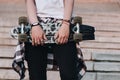 Hipster girl with skate board Royalty Free Stock Photo