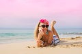 Girl talking on phone on the beach Royalty Free Stock Photo