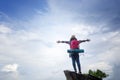 Hipster girl traveler shows independent gesture and are enjoying Royalty Free Stock Photo