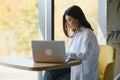 Hipster Girl use Laptop huge Loft Studio.Student Researching Process Work.Young Business Woman Working Creative Startup Royalty Free Stock Photo