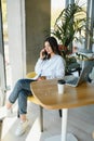 Hipster Girl use Laptop huge Loft Studio.Student Researching Process Work.Young Business Woman Working Creative Startup Royalty Free Stock Photo