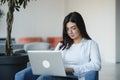 Hipster Girl use Laptop huge Loft Studio.Student Researching Process Work.Young Business Woman Working Creative Startup Royalty Free Stock Photo