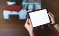 Hipster girl using tablet technology in home, blogger girl person holding computer with blank screen on background bokeh Royalty Free Stock Photo