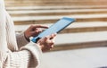 Hipster girl using tablet technology internet, blogger person holding computer on background sun city, female hands texting online Royalty Free Stock Photo