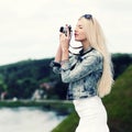 Hipster girl with vintage camera
