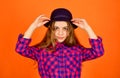 Hipster girl wear retro hat. stylish kid looking retro. checkered fashion for teen. happy childhood concept. small girl Royalty Free Stock Photo