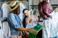 Hipster girls choosing clothes in boutique, fashion shopping girls concept Royalty Free Stock Photo