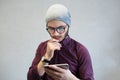 Hipster guy using smarphone on background of white.