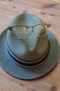 Hipster hat with horn rimmed glasses on top, modern concept