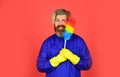 Hipster holding cleaning tool. Cleaning service. Cleaning home concept. Small colorful duster broom. Housekeeping duties