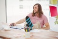 Hipster with legs on desk Royalty Free Stock Photo