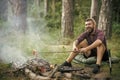 Hipster man with beard happy smile and roast sausages