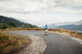 Hipster man longboarding extremely in tropcis Royalty Free Stock Photo