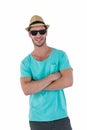 Hipster man posing with sunglasses and hat Royalty Free Stock Photo