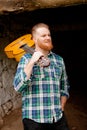 Hipster man with red beard with a guitar Royalty Free Stock Photo