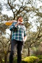 Hipster man with red beard and a guitar relaxs Royalty Free Stock Photo