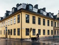 Hipster man riding an old bicycle in Stockholm