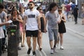 Hipster men dressed in cool Londoner style walking in Brick lane, a street popular among young trendy people Royalty Free Stock Photo