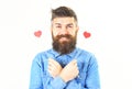 Hipster with paper red hearts and cheerful face.
