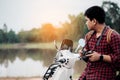 Photographer riding a motor scooter on road. Traveled by scooter slow life on vacation resting time Royalty Free Stock Photo