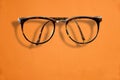 Hipster Retro fashion glasses on orange background