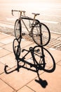 Hipster single gear fixie bicycle locked to a metal stand on a p Royalty Free Stock Photo