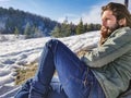 Hipster style young man smoking a vintage pipe Royalty Free Stock Photo