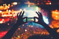 Hipster taking photos and videos at concert. Modern lifestyle with smartphone and parties. Royalty Free Stock Photo