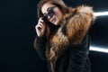 Hipster teen girl in sunglasses posing over wall Royalty Free Stock Photo