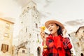 Hipster traveler eating ice-cream in old Italian town Royalty Free Stock Photo