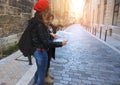 Bordeaux-France-October-17-2019:Hipster traveler with her friend pointing at street on map in Bordeaux city,France Royalty Free Stock Photo