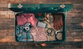 Hipster traveler packing Royalty Free Stock Photo