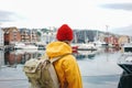 Hipster traveler walking by scandinavian city Royalty Free Stock Photo