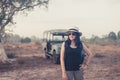 Hipster traveller asian woman standing and looking something at outdoor on during sunset,Relaxing time