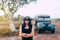 Hipster traveller asian woman standing and cross arms at nature on during sunset,Relax time