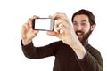 Hipster using his seflie stick Royalty Free Stock Photo