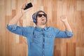 Hipster wearing sunglasses enjoying music Royalty Free Stock Photo