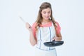Hipster woman holding frying pan Royalty Free Stock Photo