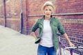 Hipster woman with vintage road bike in city Royalty Free Stock Photo