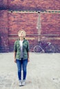 Hipster woman with vintage road bike in city Royalty Free Stock Photo