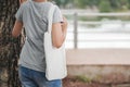 hipster woman with white cotton bag at park Royalty Free Stock Photo